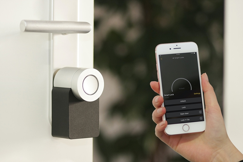 A smart home device controls the front door lock and house security. 